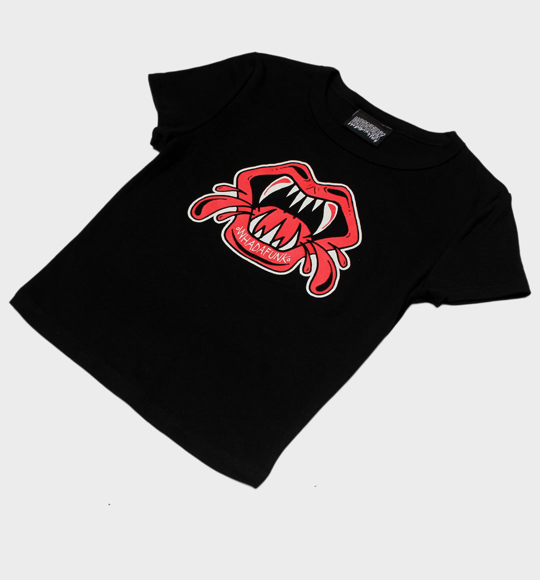 WHADAFUNK Vamp Mouth Crop Tee featuring a bold vampire lips design, perfect for edgy women's streetwear.