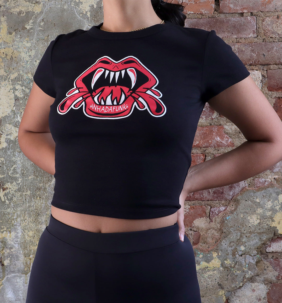 WHADAFUNK Vamp Mouth Crop Tee featuring a bold vampire lips design, perfect for edgy women's streetwear.