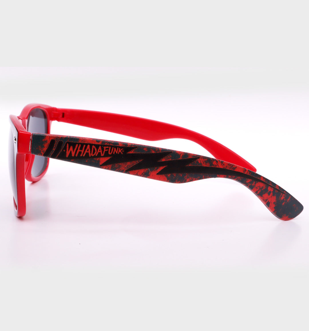 WHADAFUNK Red Lightning Sunglasses with bold lightning bolt design and red frames for streetwear style.