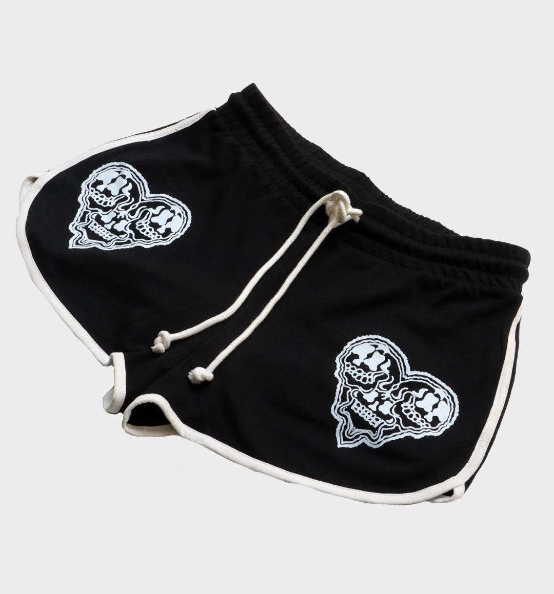 WHADAFUNK Skull Heart Striped Shorts with bold skull and heart graphic design and striped detailing for streetwear style.