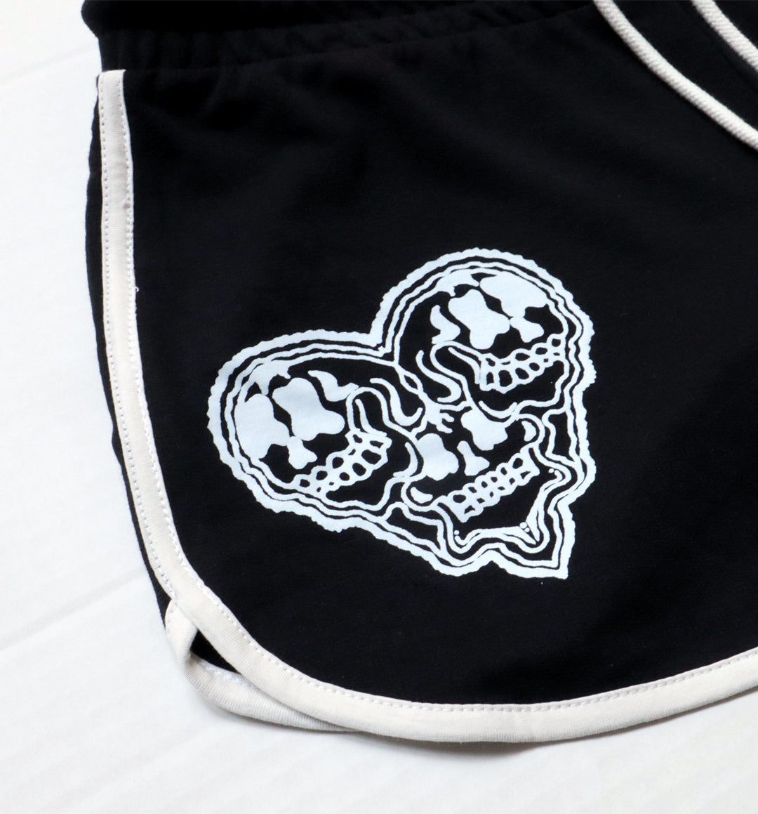 WHADAFUNK Skull Heart Striped Shorts with bold skull and heart graphic design and striped detailing for streetwear style.