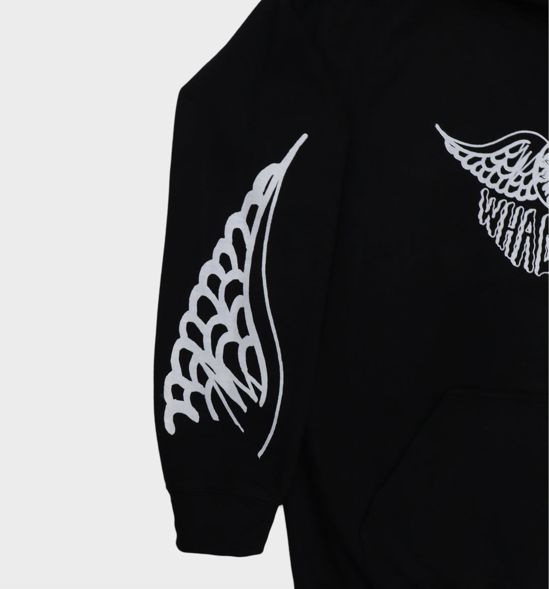 Sleeve of hand-drawn winged skull and eye design on hoodie