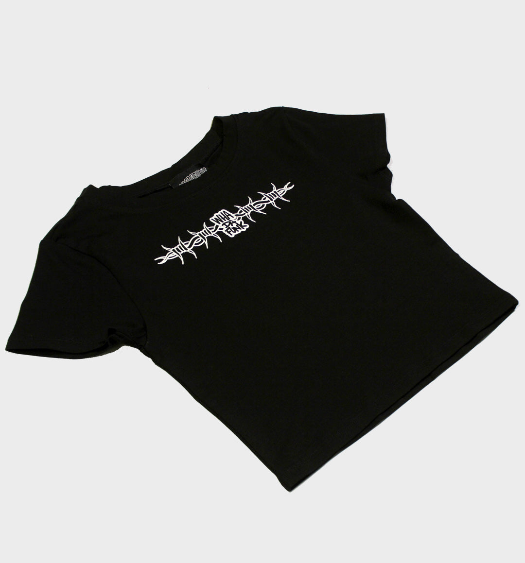WHADAFUNK Barbed Wire Crop Tee featuring bold barbed wire graphic in streetwear style.