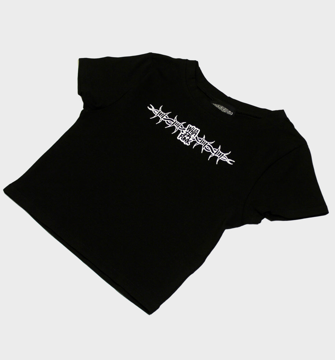 WHADAFUNK Barbed Wire Crop Tee featuring bold barbed wire graphic in streetwear style.