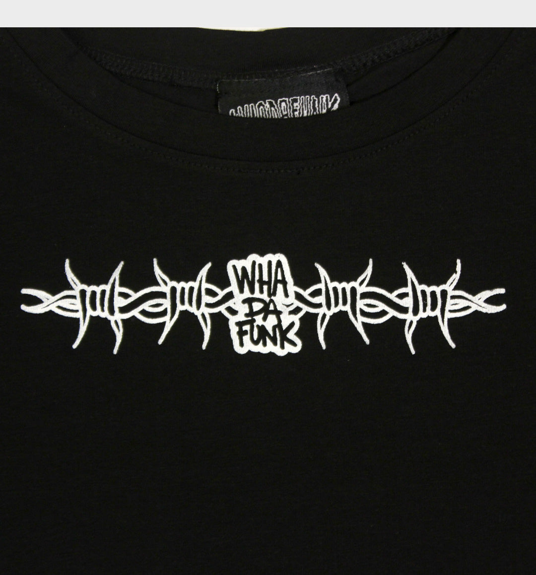 WHADAFUNK Barbed Wire Crop Tee featuring bold barbed wire graphic in streetwear style.