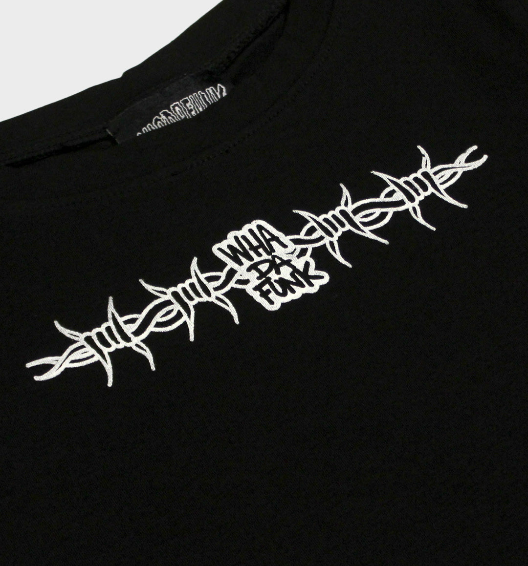 WHADAFUNK Barbed Wire Crop Tee featuring bold barbed wire graphic in streetwear style.