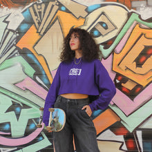 Load image into Gallery viewer, WHADAFUNK Chained Purple Crop Hoodie with bold chained graphic design in vibrant purple.
