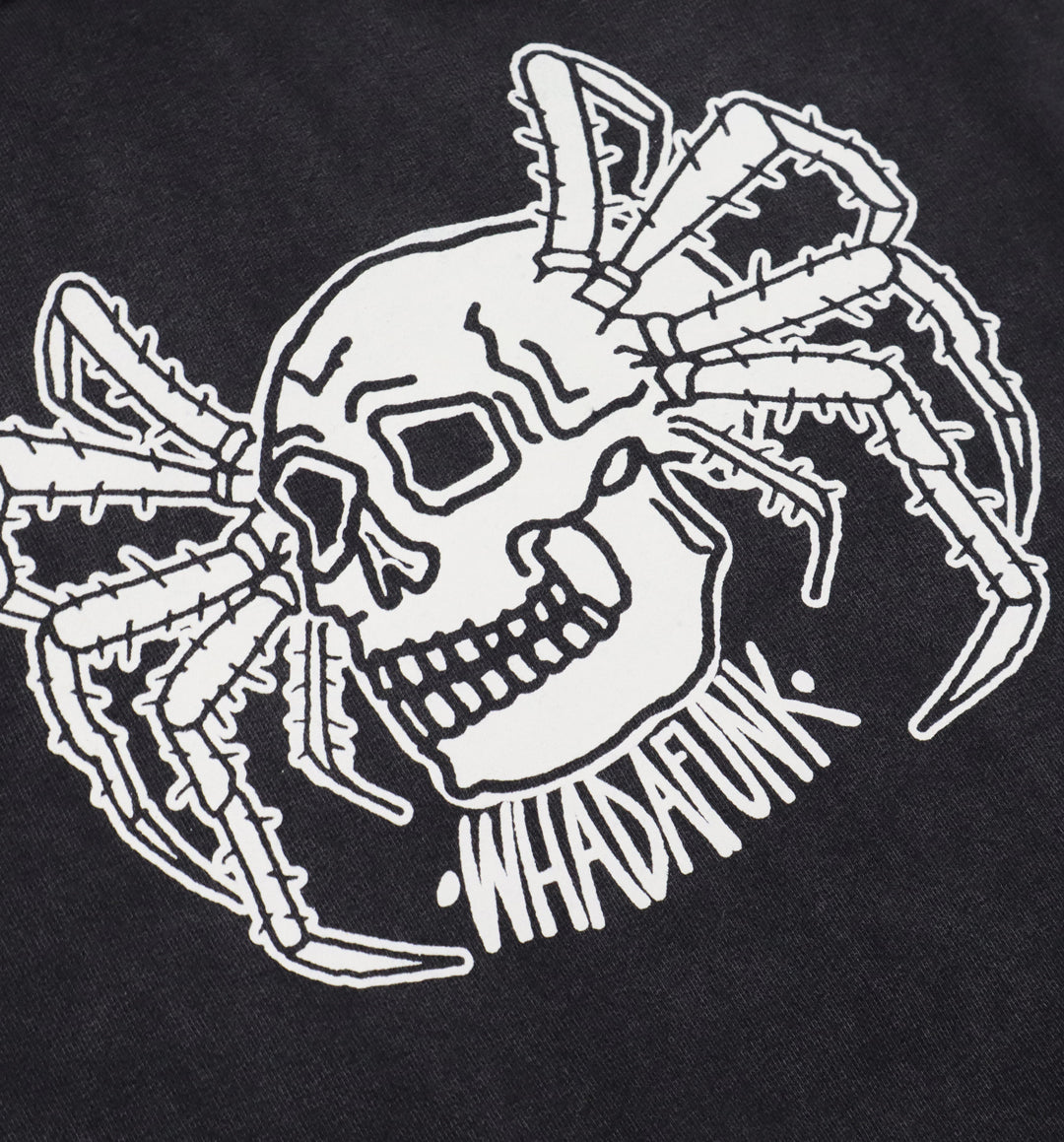 Close-up of hand-drawn spider and skull design on hoodie close angle