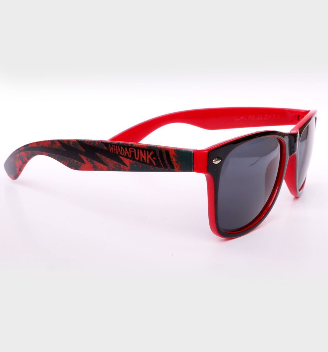 WHADAFUNK Red Lightning Sunglasses with bold lightning bolt design and red frames for streetwear style.