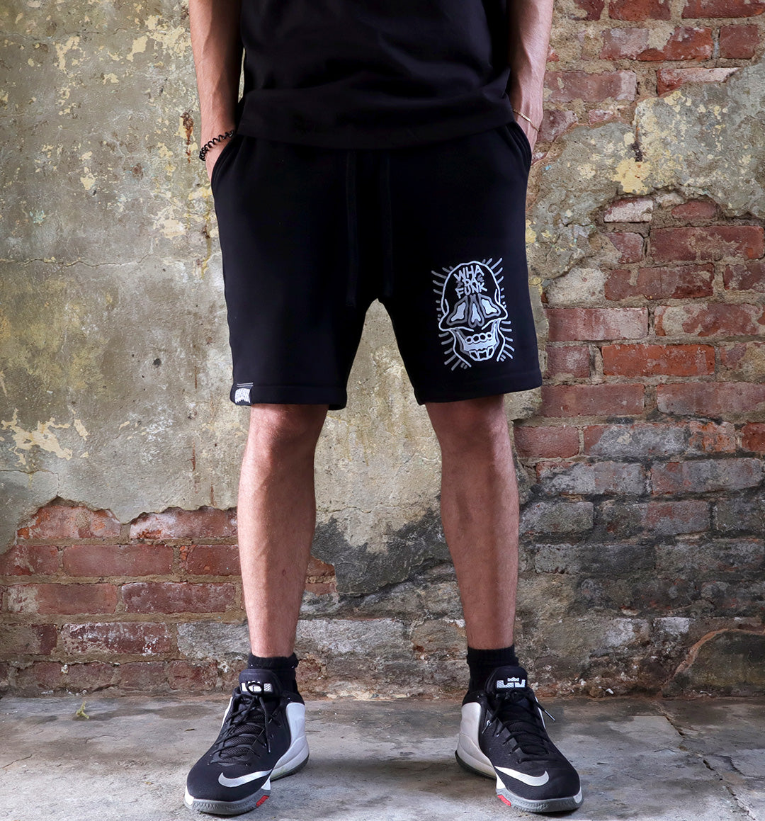 WHADAFUNK Skull Face Men's Shorts featuring a bold skull graphic design for streetwear style.