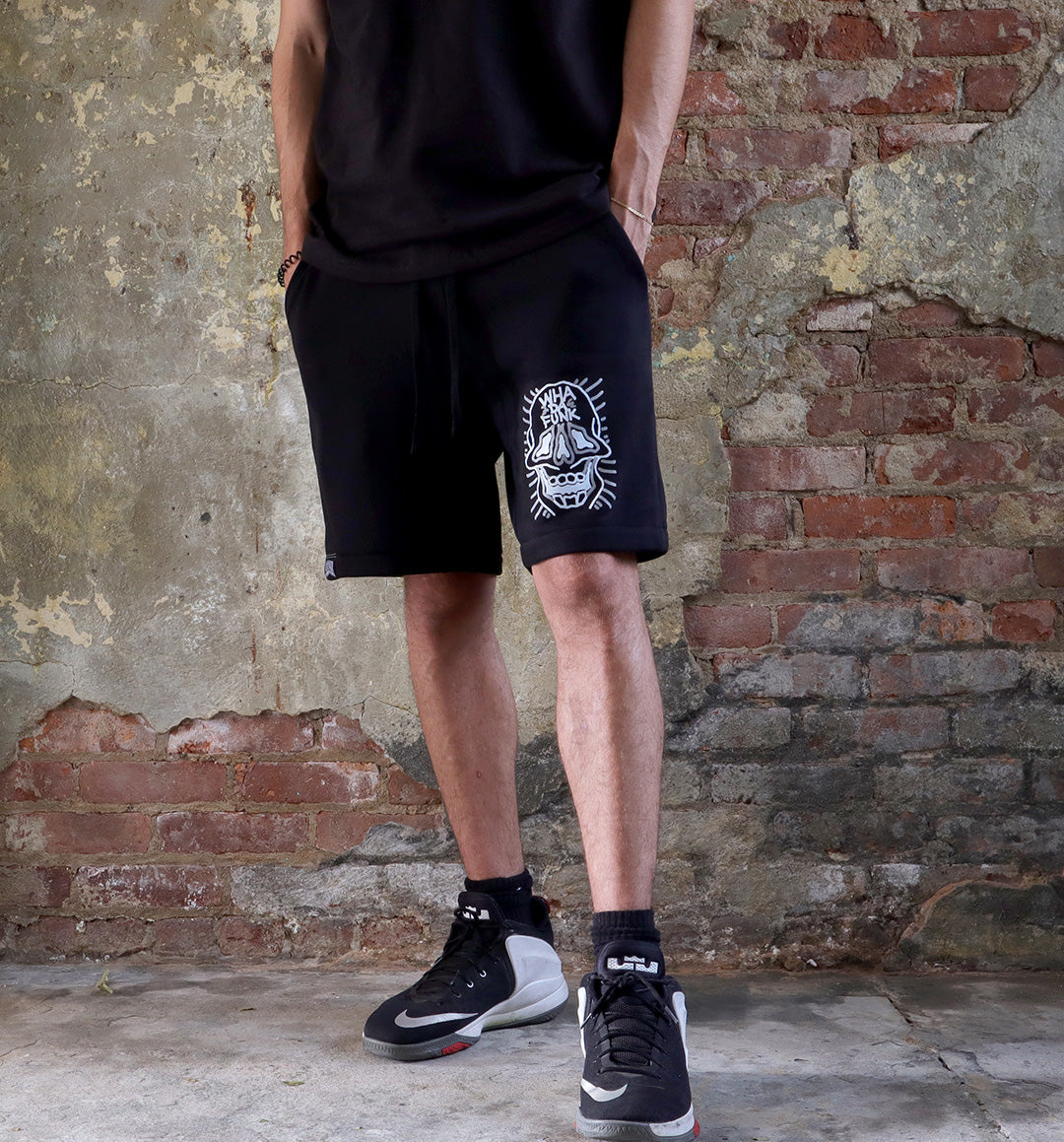 WHADAFUNK Skull Face Men's Shorts featuring a bold skull graphic design for streetwear style.