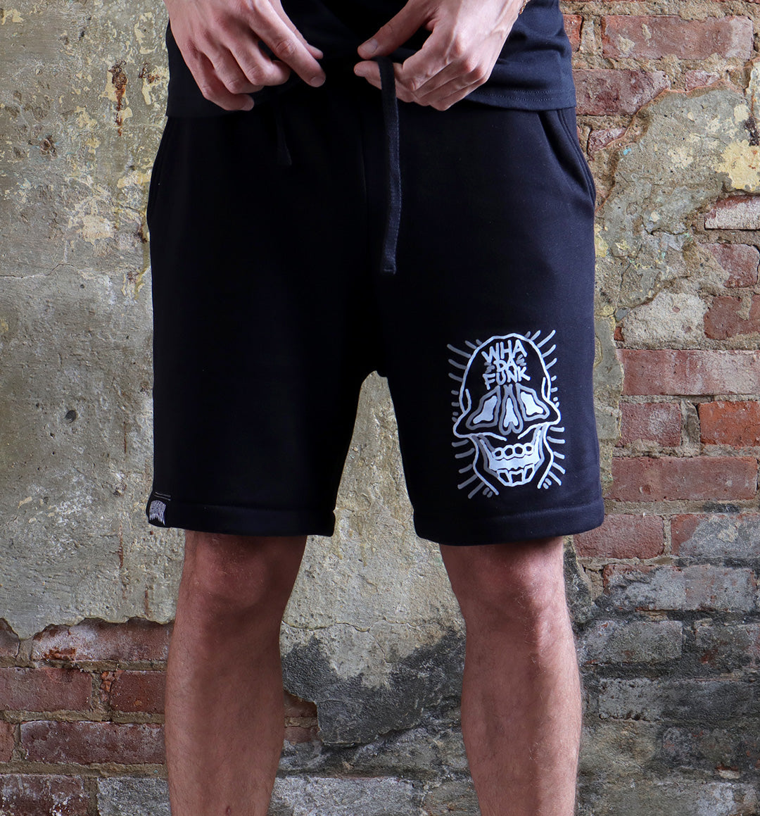 WHADAFUNK Skull Face Men's Shorts featuring a bold skull graphic design for streetwear style.