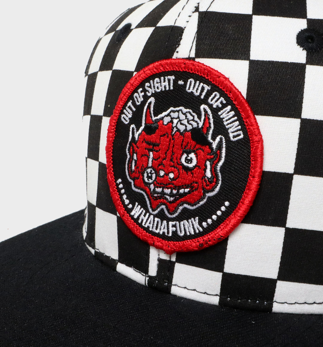 WHADAFUNK Out of Sight Checkered Snapback Hat with bold graphic design for streetwear fans.