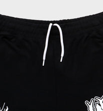 Load image into Gallery viewer, WHADAFUNK Shattered Black Shorts with bold shattered pattern design for streetwear.
