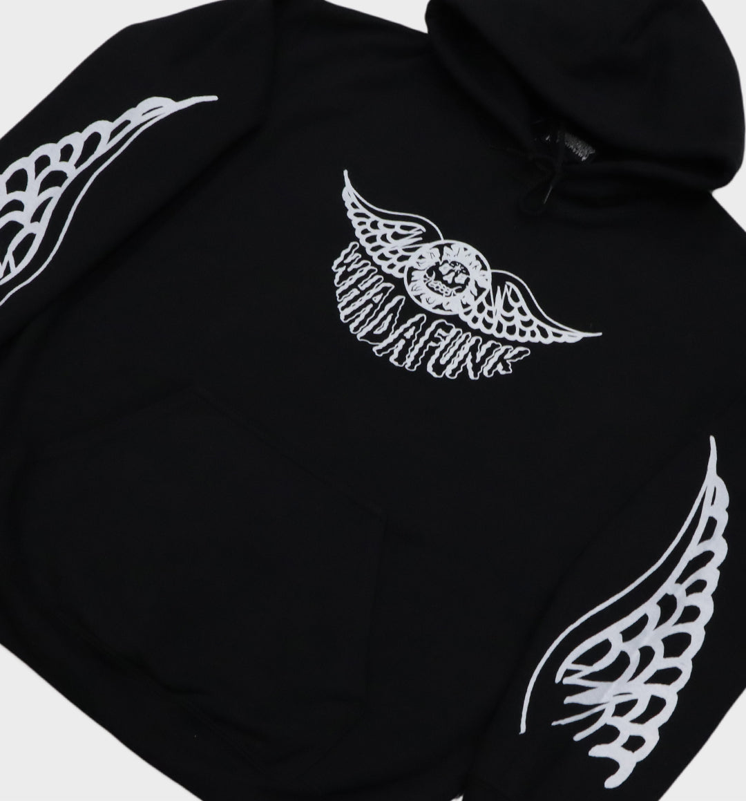 Side angle details of hand-drawn winged skull and eye design on hoodie