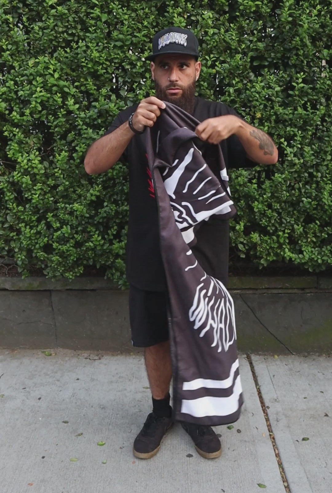 WHADAFUNK Stay Wild Beach Towel featuring bold and vibrant design perfect for the beach or pool.